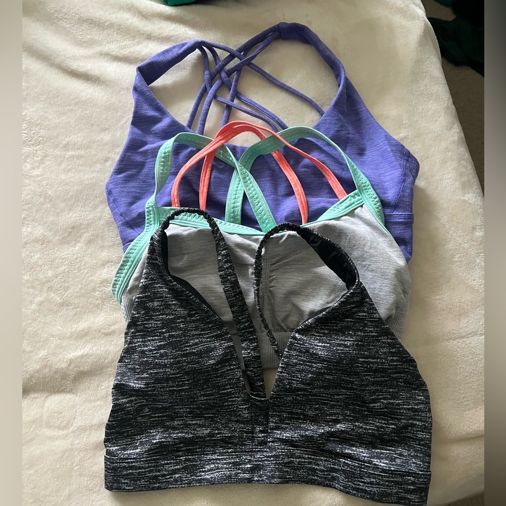 Set of three Victoria’s Secret sports bras. Size small fits 32CB best.